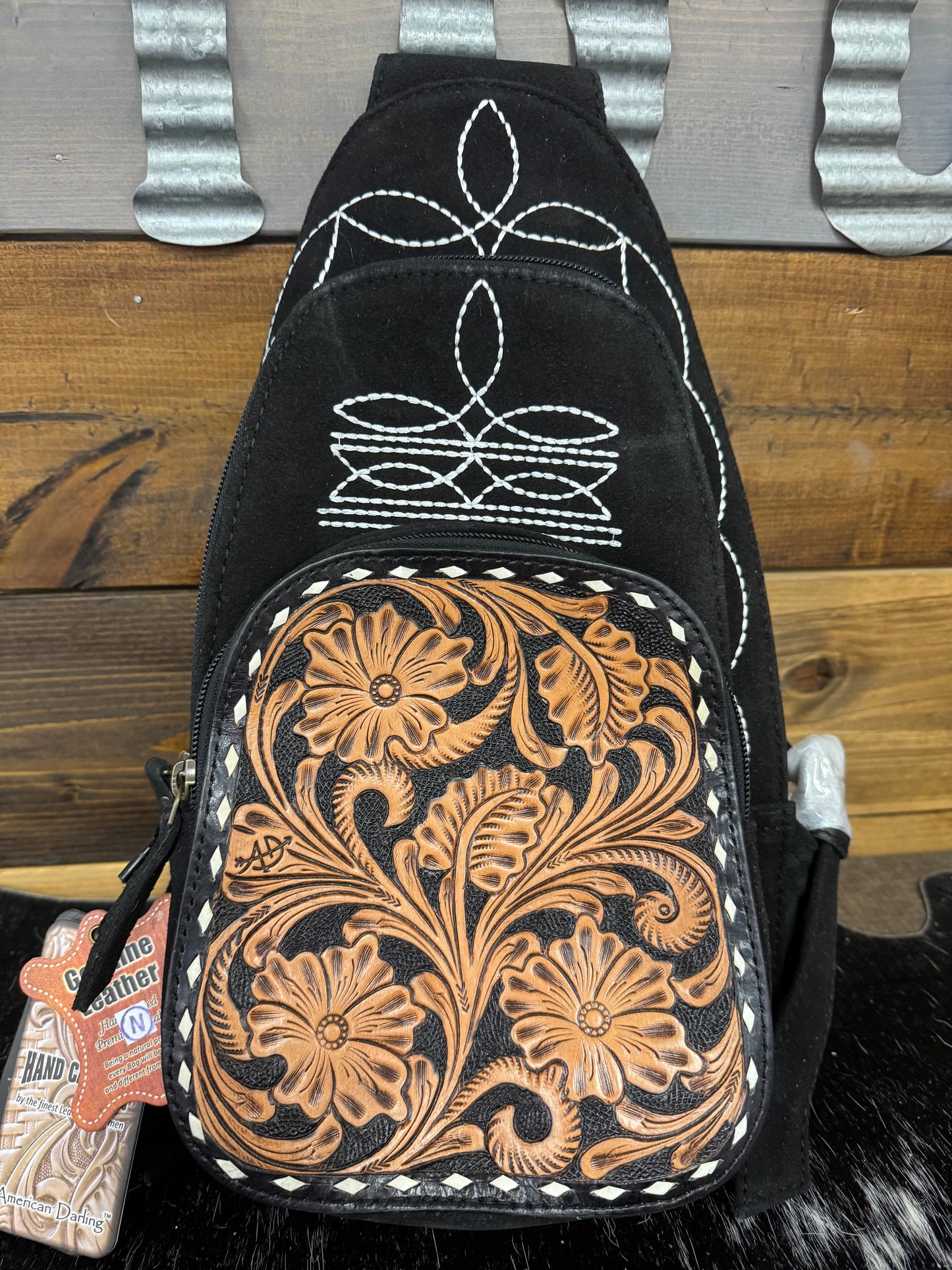 Suede Tooled Sling Backpack