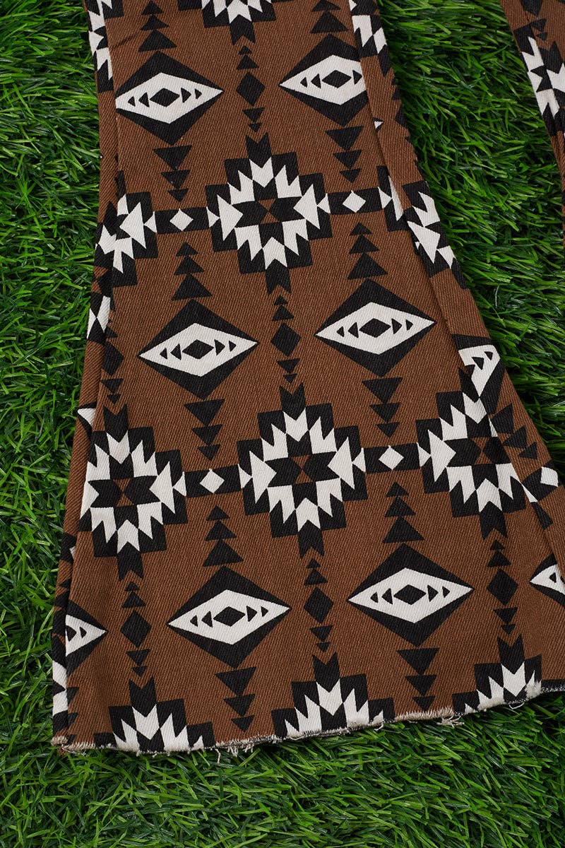Brown aztec printed bootcut denim pants.