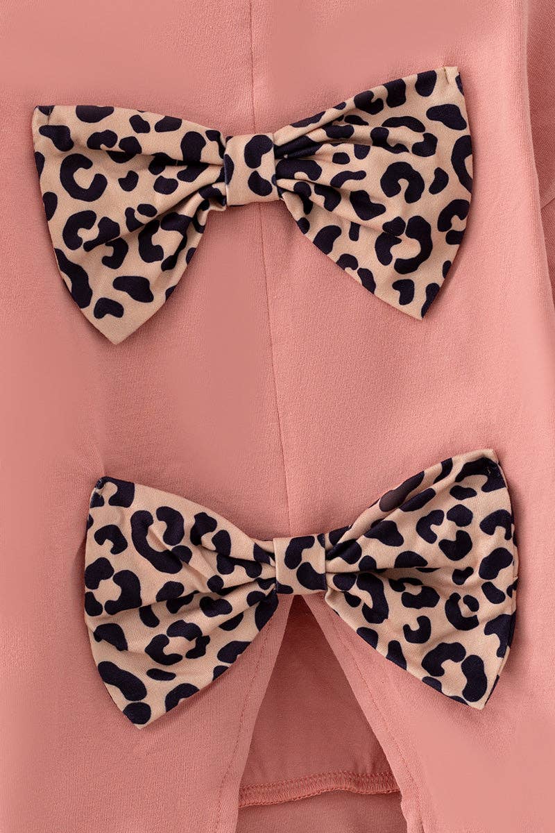 Blush girls long sleeve top with tan bottoms.