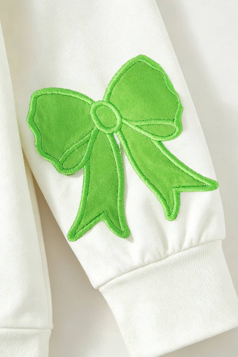 White Christmas application top and multi color stripe bottoms.