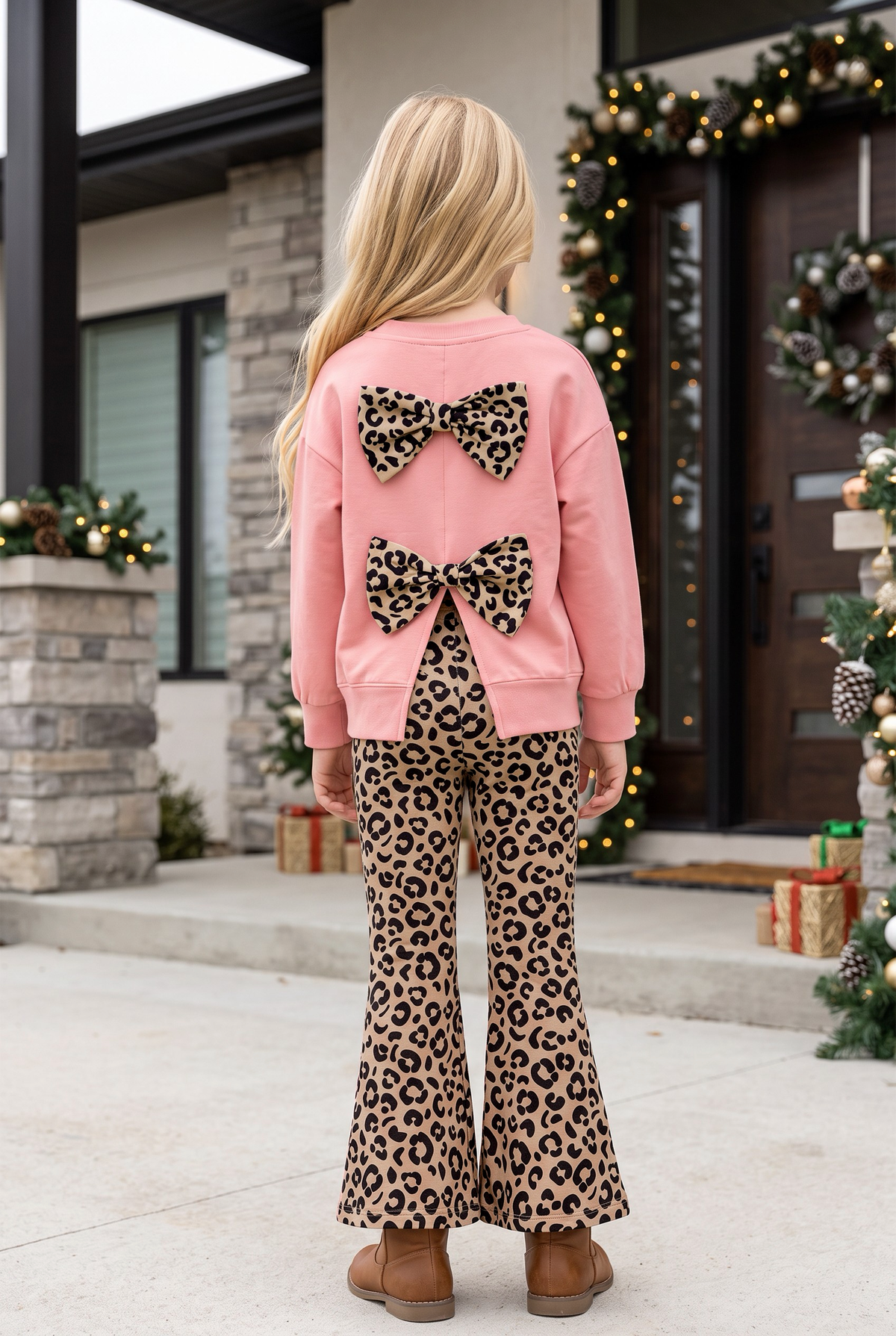 Blush girls long sleeve top with tan bottoms.