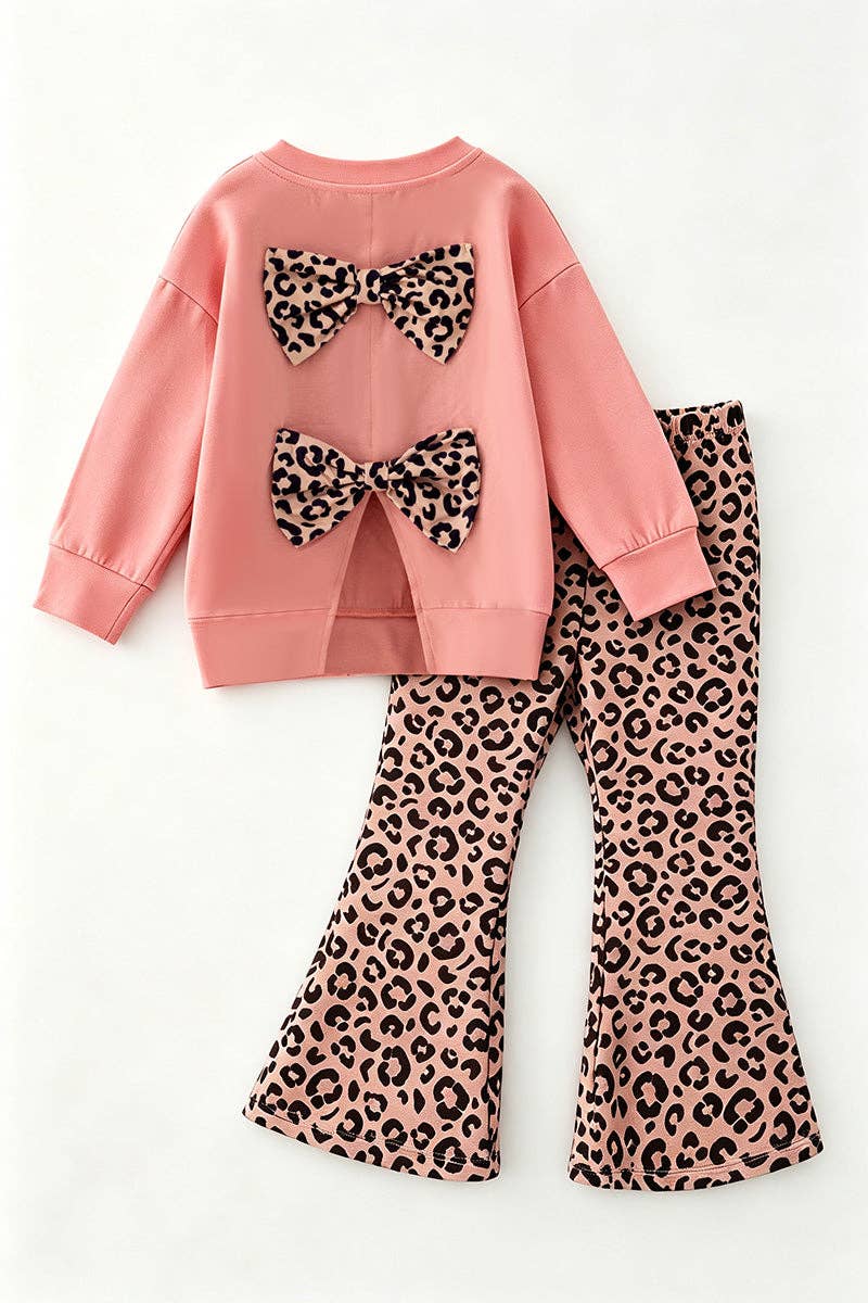 Blush girls long sleeve top with tan bottoms.